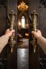 Cobra door handle set installed on double doors, gothic entry door hardware with realistic lighting and shadows