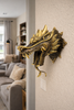 Dragon head wall mount displayed on interior wall as statement gothic decor.