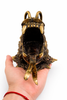 Front view of brass dragon head wall sculpture with open mouth and detailed teeth