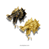 Two brass dragon head wall sculptures shown together in gold and antique finishes