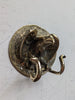 Close-up front detail of eagle snake wall hook in solid brass, intricate antique design, gothic decor and dark academia wall hook, double hook functionality, unique animal wall hook and statement home decor