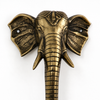 Close up of handcrafted brass elephant door handle showing artisan details, solid brass hardware, elephant decor, antique door handle set and luxury entry hardware