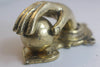 close up photo of the gold finishing brass fist and ball hand gothic door knocker

