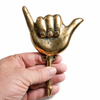 Gold brass shaka wall hook held in hand hang loose hook size reference