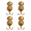 Close-up of handmade brass pineapple wall hook showing detailed texture