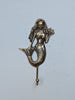 gold finishing brass hollow mermaid wall hook on white wall