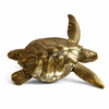 Large brass sea turtle sculpture in gold finish for coastal luxury decor and ocean inspired interiors