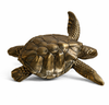 Large brass sea turtle sculpture side view showing detailed shell and fin design