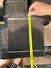 Measuring the large tree fern fiber mount board width for vertical plant mounting