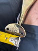 Measuring depth projection of solid brass seashell door handle from door surface