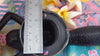 Close-up measurement of screw spacing for mermaid door handle installation