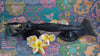 Side view of mermaid door handle showing thickness and solid brass construction