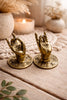 Mini brass Buddha mudra hands bundle (4 sets) shown as jewelry holders on neutral boho styling