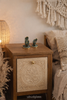 Mini brass mudra hand hardware styled in bedroom, decorative cabinet pull that doubles as jewelry holder and small wall hook