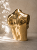 Moody lighting on brass female torso sculpture, gold body sculpture for boudoir decor, after dark decor, maximalist home decor, luxury sculptural art object