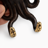Close up detail of octopus tentacles used as decorative hanging hooks