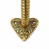 Close up of decorative base plate on brass elephant trunk door handle, antique brass hardware, luxury statement door hardware and handcrafted elephant decor