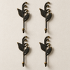 Set of four patina brass sprout leaf hooks in a dark aged bronze finish arranged in a grid on a cream background