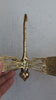 Video showing handmade brass dragonfly wall hook details and sturdy hook shape for coats, towels and bags.