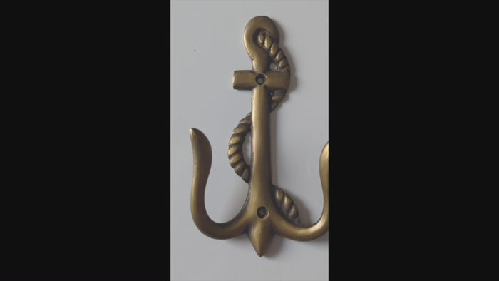 Video showing brass anchor wall hook with nautical coastal design and texture detail