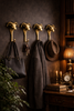 Set of 4 ram head wall hooks in dark academia library, gothic brass coat hooks