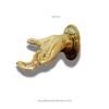 right side gold solid brass hand fingering gesture towel hanger with white background
