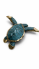 Sea turtle sculpture in green patina finish for ocean decor and coastal interior styling
