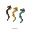 Seahorse cabinet pull available in multiple finishes including antique brass, gold and green patina solid brass hardware