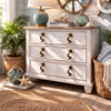 Seahorse brass cabinet pulls installed on coastal style dresser drawers, decorative nautical furniture hardware for beach house interiors