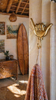 Shaka hand wall hook styled in coastal entryway decor towel hanger boho wall hook