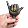 Antique shaka wall hook mounted on wooden wall coastal decor hook