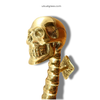 Close-up of skull head detail on skull spine door handle, gothic bronze door pull hardware
