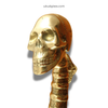 Side close-up of skull spine door handle head showing finish and sculptural detail
