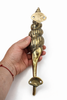 Solid brass seashell door handle shown in hand for size reference coastal door hardware