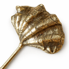 Close up of solid brass seashell wall hook showing detailed texture