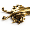Close up brass squid tentacle wall hook detail ocean inspired coastal decor