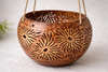 Coconut hanging planter with flower carved pattern