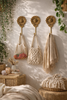 Brass sunflower hooks holding tote bags, cottagecore wall storage idea