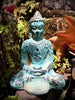 Front view turquoise Buddha statue in garden meditation decor spiritual Bali statue
