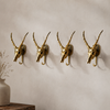 Easy No Tariffs graphic for UbudGlassandBrass — brass impala skull wall hook set of 4 ships from USA with all import fees covered no surprise charges for US buyers