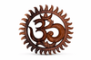 Hand carved wooden Om wall hanging front view on white background showing detailed om symbol and sunburst border carving – solid wood natural finish – yoga meditation boho spiritual home decor – om symbol wall art – 3 sizes 6 inch 8 inch 12 inch – made in Bali