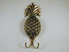 Decorative Large Gold Brass Pineapple double hook on white wall