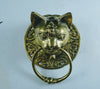 Real photo of the brass cat head towel ring on a light background, showing the true color of the polished brass, the cat face and the ornate round plate with ring. Handmade vintage towel ring and cat door knocker from Bali.