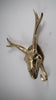 Brass deer hook as entryway wall décor accent