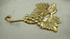 Brass grape wall hook laid flat, rustic wall decor, antique brass hook for kitchen or wine bar