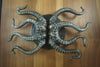 Brass octopus door handle used as a solid brass front door pull on an entry door