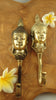 Buddha wall hook in boho zen decor styling with warm tones, ideal for yoga studio and meditation room