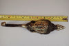 Buddha wall hook measured with tape showing full length for accurate size reference