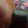 Inside coconut shell lamp shade showing easy fit over outdoor string light socket