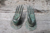 Real photo of green patina brass hand hooks set of 2, mudra wall hook pair used as robe, towel or key hooks.